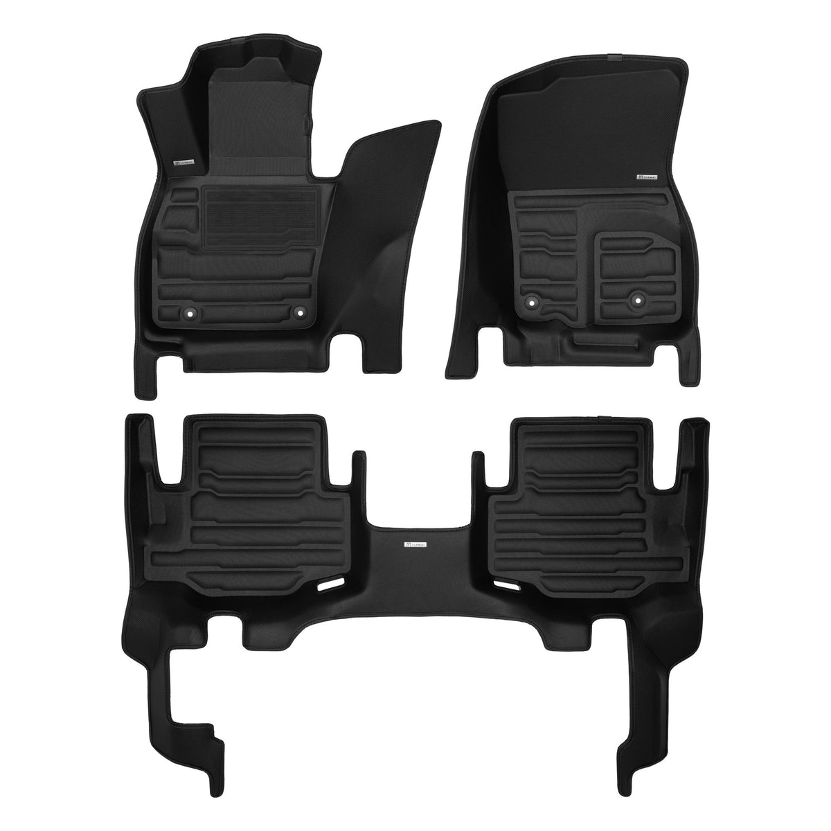 Set of black car floor mats on a white background