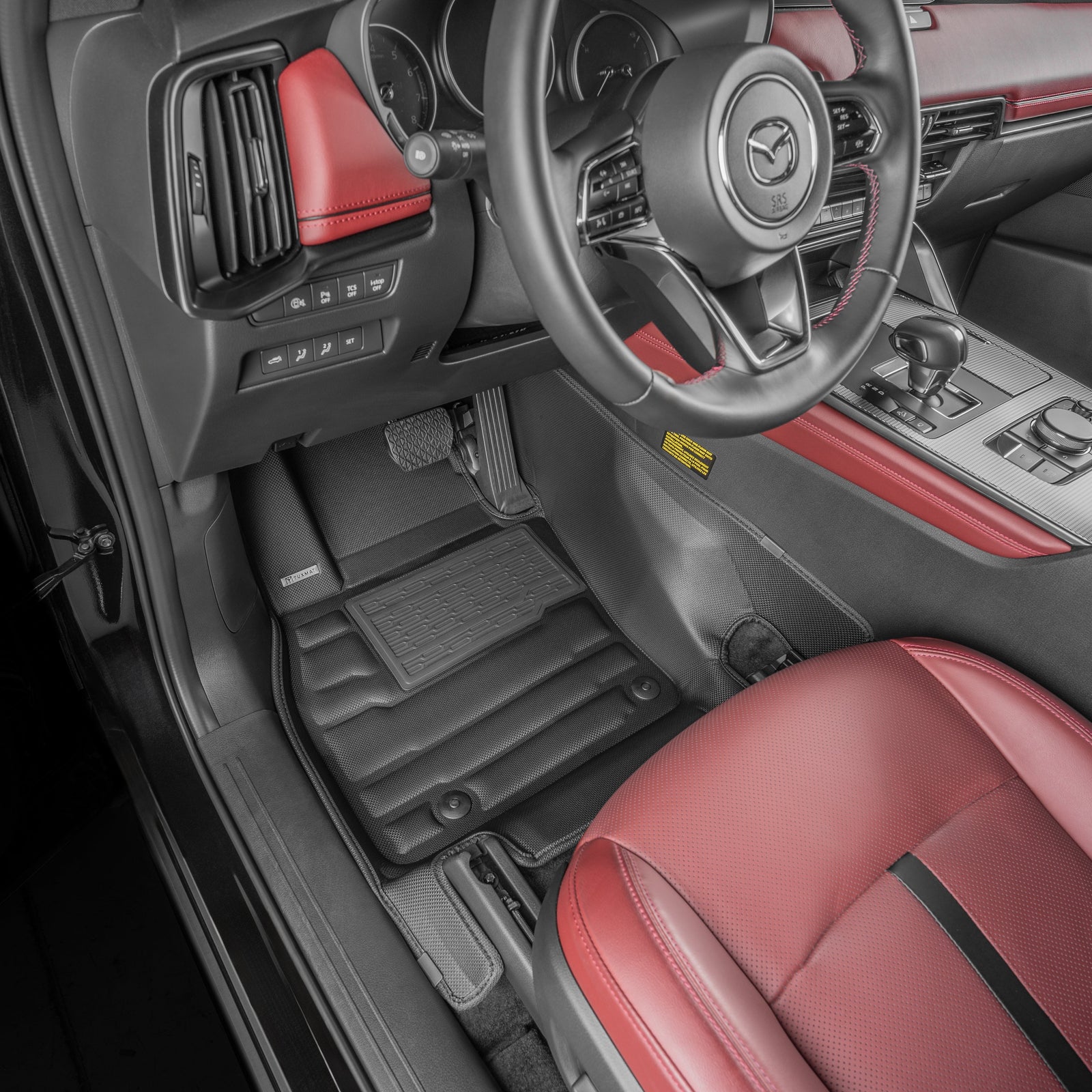 Car interior with red and black seats and dashboard