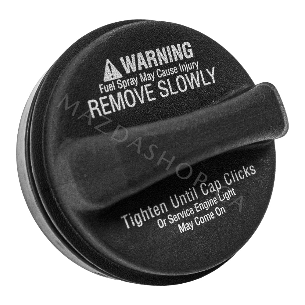 Black fuel cap with warning text on a white background